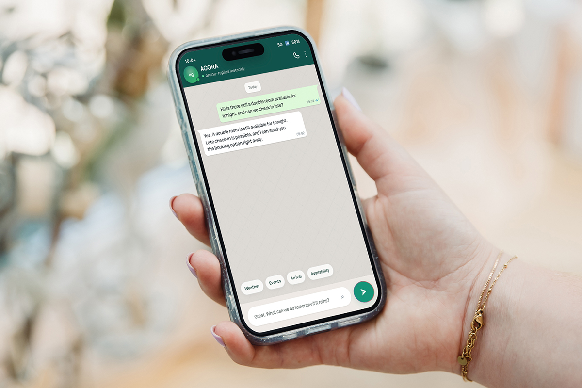 AI tourism chatbot on a smartphone, illustrating how reliable Open Data Hub datasets can support digital guest services.