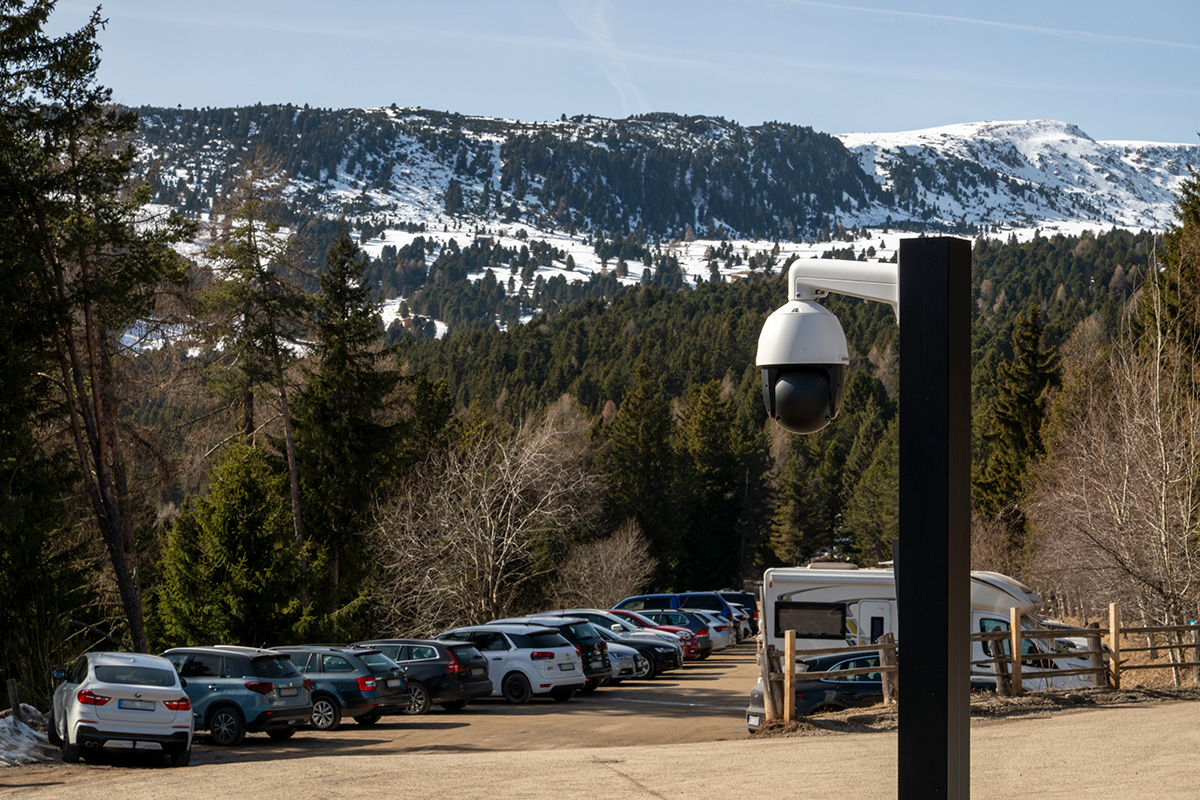 AI-powered camera monitoring a parking area to support real-time parking occupancy analysis.