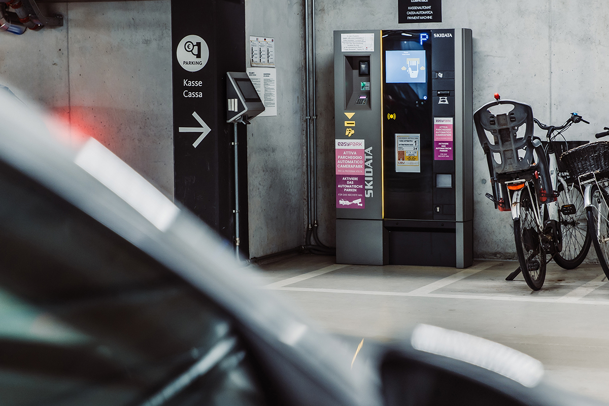 SKIDATA parking pay station in an underground car park, sharing real-time occupancy data via Open Data Hub.