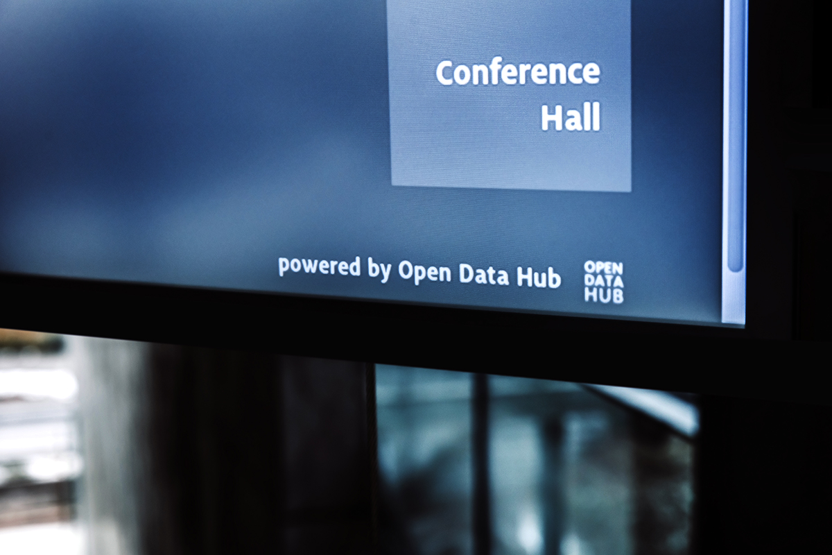 Digital display at Eurac Research Center showing upcoming events, powered by Open Data Hub's data visualization.